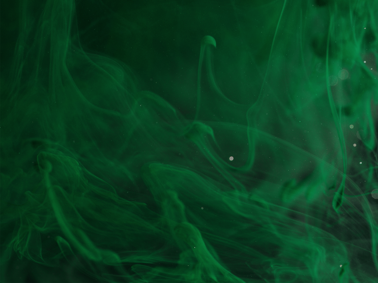 Abstract image of ink in water colored Terumo green